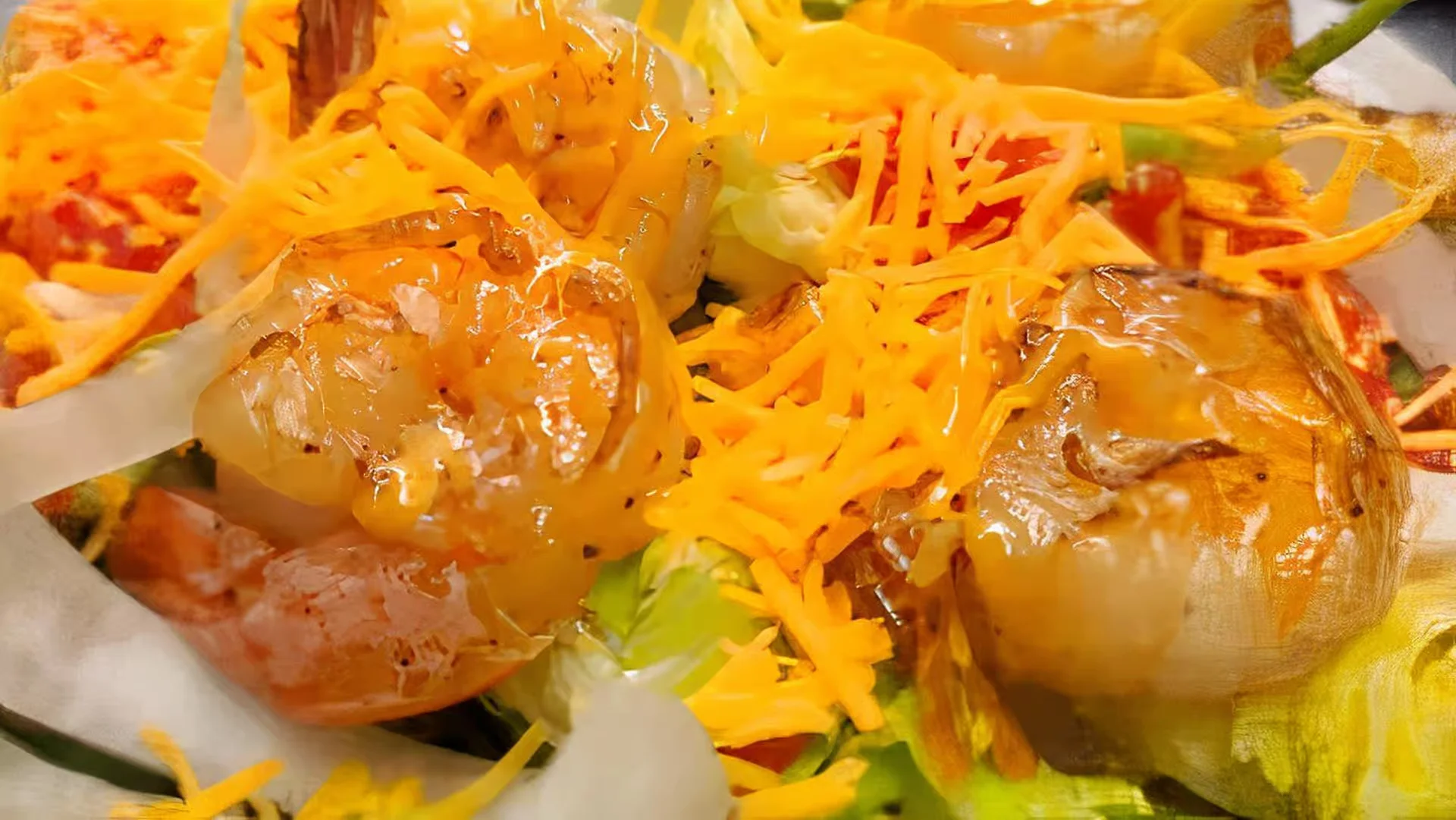 Shrimp Salad - Fresh salad topped with seasoned shrimp, avocado, and house dressing